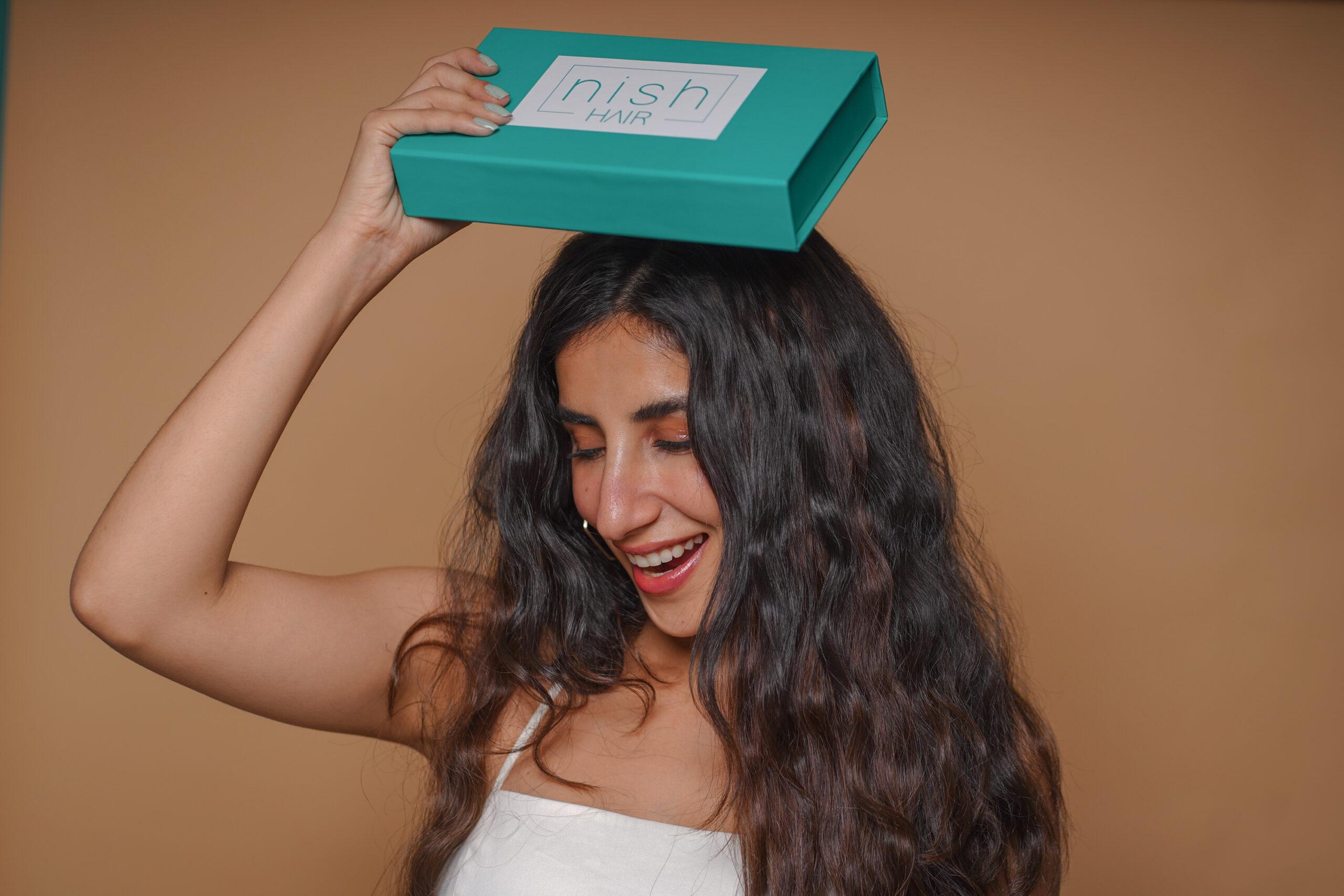 This is the image of Parul Gulati the actress and entreprenure of Nish Hair.
